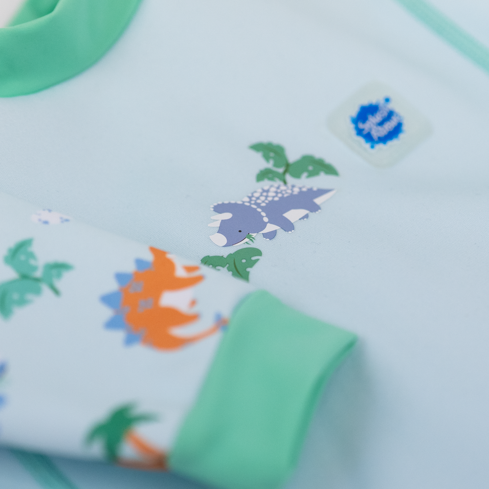 Close up of dinosaurs themed print.