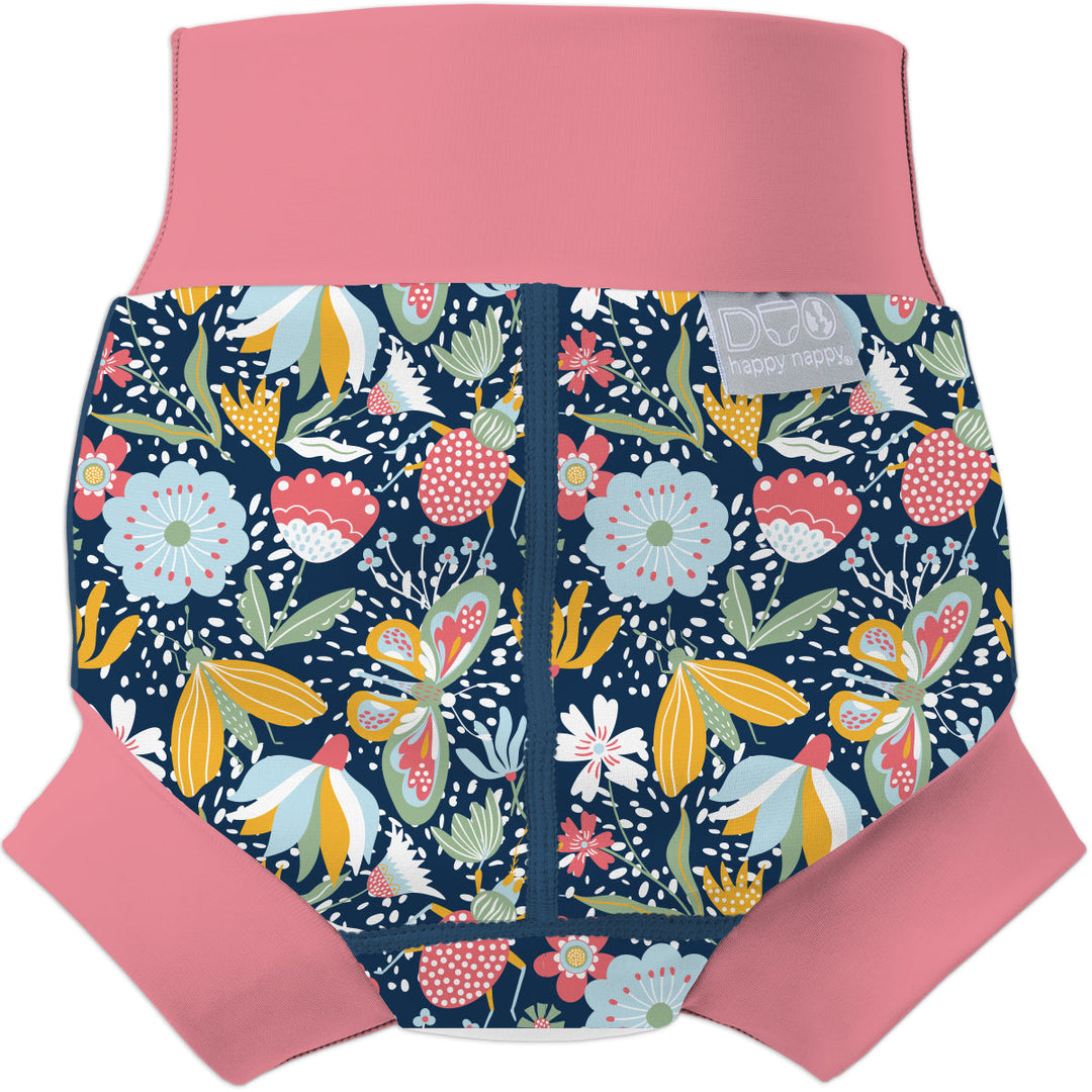 Neoprene swim diaper in navy with pink trims, and floral themed print. Back.