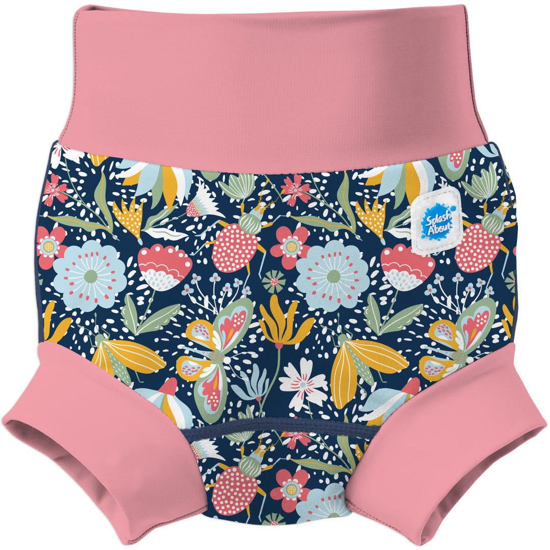 Neoprene swim diaper in navy with pink trims, and floral themed print. Front.