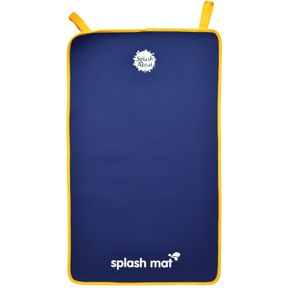 Navy and yellow neoprene changing mat on the floor