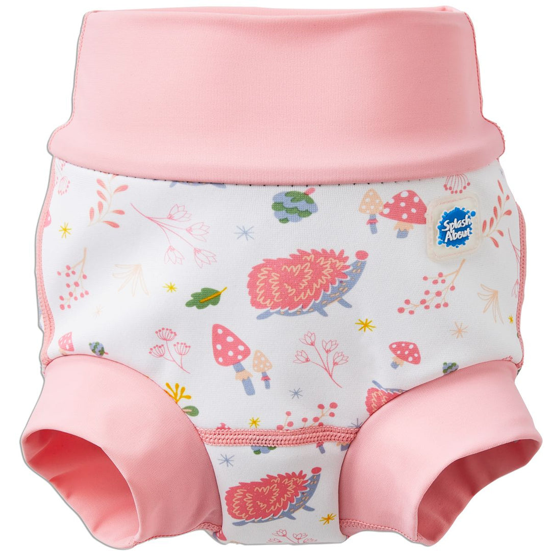 Reusable swim nappy in white with light pink ribs and forest themed print, including mushrooms, hedgehogs, leaves and flowers. Front.