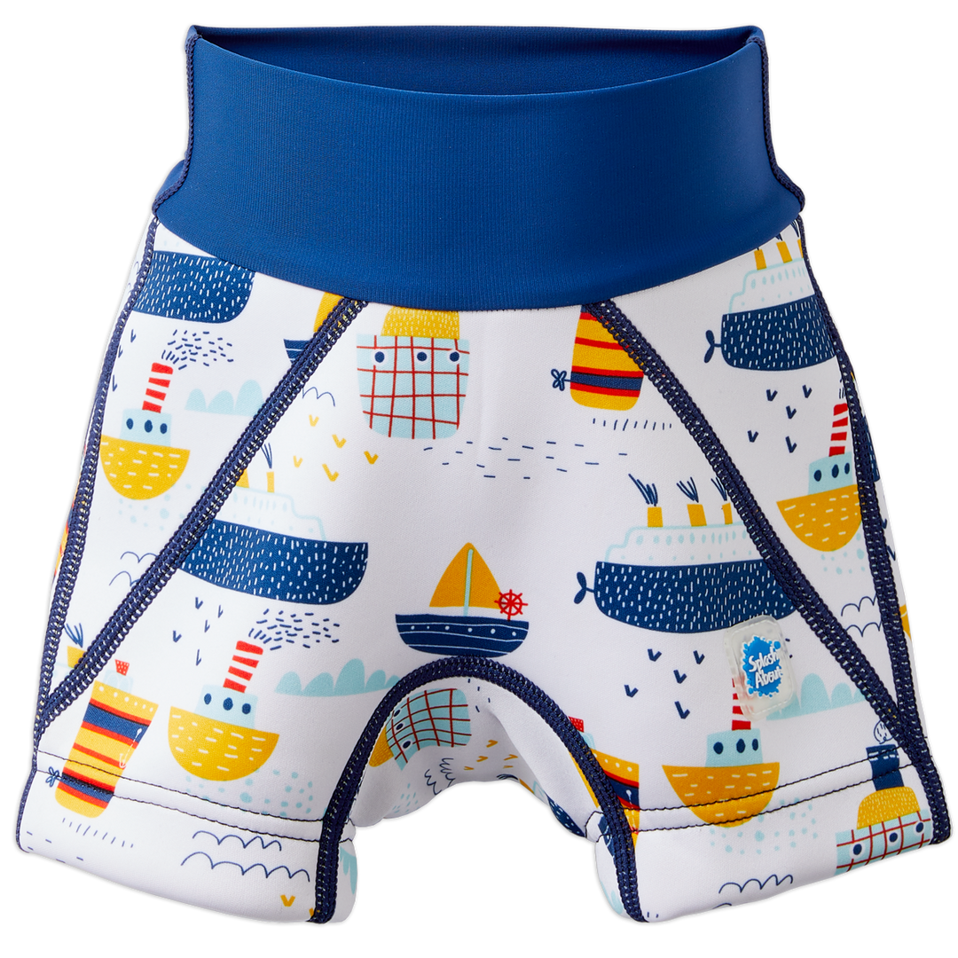 Neoprene swim shorts in white with blue navy waist and boats themed print. Front.